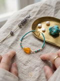 The Resonance of Primal Balance | Natural Baltic Amber & Turquoise Beaded Bracelet