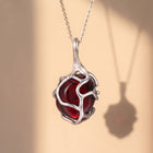 Deep Red Garnet Crystal Pendant | Sculpted Silver Wire-Wrapped Stone Necklace
